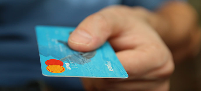 credit card in a persons hand
