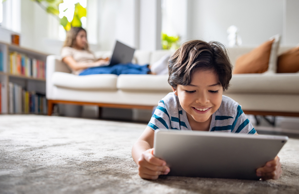 A family enjoying seamless internet on multiple devices.